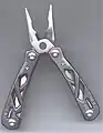 A Gerber Suspension pocket tool, pliers open