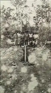 Australian troops after digging up a German land mine along Bita Paka Road during the New Guinea Campaign