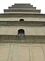 Close-up view of the eaves and exterior bricks