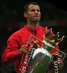 Ryan Giggs holding the Premier League trophy