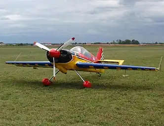 Giles G-202 aerobatic airplane parked at Lučko Airport