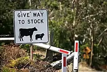 Image 44This Australian road sign uses the less common term "stock" for livestock. (from Livestock)