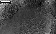 Possible Glacial Cirque in Hellas Planitia, as seen by HiRISE, under the HiWish program. Lines are probably due to downhill movement.