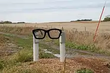 Signpost near the Clear Lake crash site where Buddy Holly died.