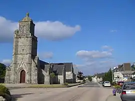 The church and main road of Glomel