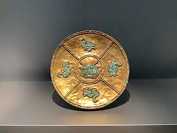 a gold and turquoise  plate from the Yarlung Dynasty of Tibet (600-800 AD), The Al Thani Collection