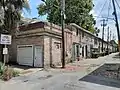 Ramshackle line of carriage houses at the rear, 2021