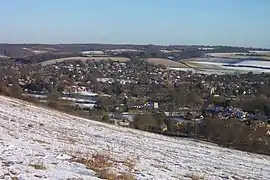 The river and gap seen from Lardon Chase on a snowy January day, with the Chilterns in the background