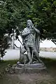 A zinc statue of Saint Hubert and a deer outside Bistra Castle in Slovenia