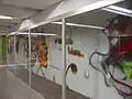 Graffiti art decorating a passageway in Metro Hidalgo by "parkone"