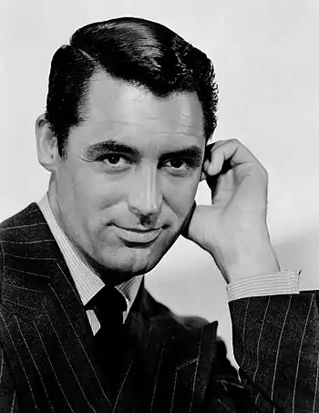 Cary Grant, by RKO Pictures publicity photographer (edited by Crisco 1492)