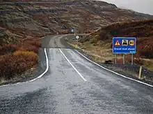 Image 26Pavement ends and turns into gravel surface road (from Road surface)