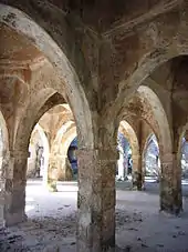 Vault of a ramshackled possibly ruined building.