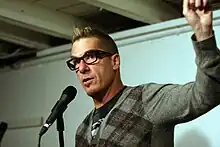 Greg Behrendt appearing for The Meltdown in 2011