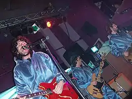 Left to right: Gruff Rhys, Guto Pryce and Huw Bunford of Super Furry Animals at Bridgwater Palace in September 2005.