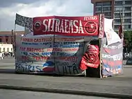 Image 7Camp put up by striking Pepsi-Cola workers, in Guatemala City, Guatemala, 2008.