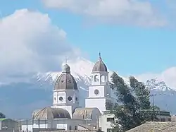 Guaytacama with Cotopaxi volcano in the background