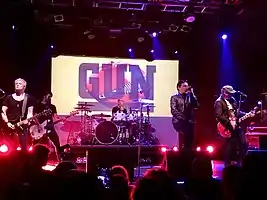 Gun headlining London's Electric Ballroom in 2017.From left to right: Andy Carr, Paul McManus, Dante Gizzi, and Jools Gizzi.