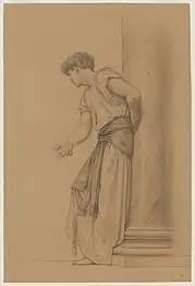 Youth leaning against pillar