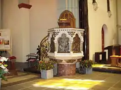 The ornate raised pulpit