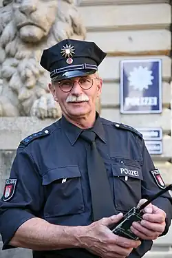 Image 27Police Staff Captain of the Hamburg police department on assignment at Hamburg city hall (from Government of Hamburg)