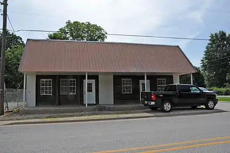 The bank may have been destroyed or extensively remodeled after extreme deterioration. This building stands on the site. (2015 photo)