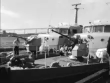 HMAS Aware (left) alongside HMAS Archer in Port Kembla Harbour, August 1968