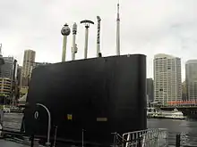 HMAS Onslow's fin and masts.