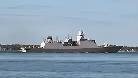 Picture of the side of HNLMS Tromp in 2009, departing Naval Station Norfolk, Norfolk, Virginia, United States.