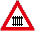 Level crossing with barriers ahead