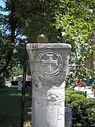 Column and capital with a Greek cross