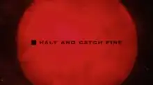 The words "HALT AND CATCH FIRE" in black block letters are set in front of a red circle in the background.