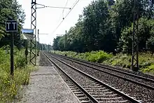 Pancarte TT (tête du train) et miroir à l'extrémité sud du quai