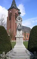 The monument to the dead and church of Hamelincourt