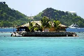 Happy Island sits in the outer harbour of Clifton, Union Island