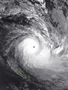 Infrared satellite image of Harold featuring a clear eye and a large rainband to its south