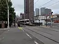 The rail crossing north of the station on 4th Street.