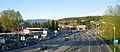 Hastings Street joins Inlet Drive (on the left) while continuing uphill towards Simon Fraser University. Eagle Ridge and Westridge in the distance.