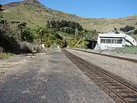 Looking along the Heathcote station platform in the direction of the Lyttelton rail tunnel.