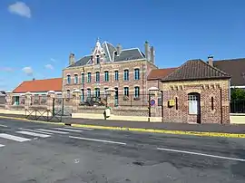 The town hall and schools of Helfaut