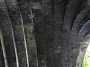 View of the intrados of the arch, looking upwards. The blue engineering bricks are stained white in part by minerals leached from the mortar, but in general the brickwork is in good condition.