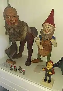 Historical gnomes  in a museum display at the Gnome Reserve in Devon UK