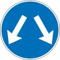 Vehicles may pass either side to reach same destination