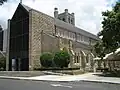 Exterior of nave, showing stonework from successive extensions