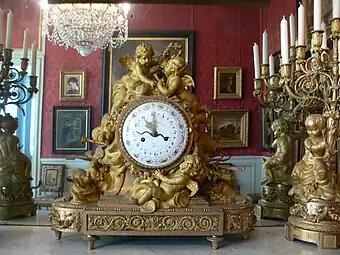 Second Empire style (Louis XVI Revival style) clock, unknown sculptor, dial and mechanism by Ferdinand Berthoud, c. 1860, gilt bronze, Château de Compiègne, France