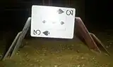 A demonstration of using cards for balancing and support