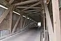 The inside of the bridge showing the Burr arch truss