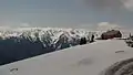 The visitors center at Hurricane Ridge, The Bailey Range beyond.