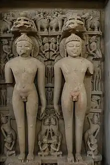 Image of nude non-erotic scupture at Khajuraho, showing two naked men