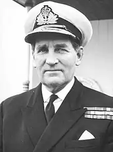 Black and white portrait photograph of Sir Ian Lachlan Mackay McGeogh wearing naval uniform and cap